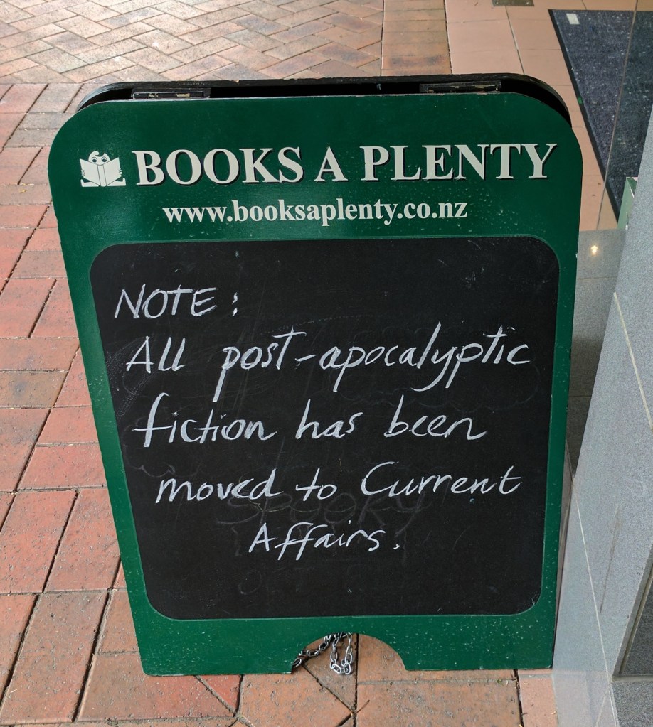 Sign outside bookshop, Tauranga